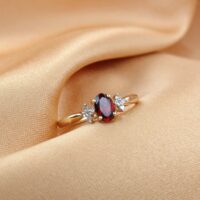 0.60ct Garnet & Diamond Ring 9ct Yellow Gold from Ace Jewellery, Leeds