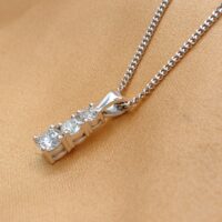 0.83ct Three-Stone Graduated Diamond Pendant Necklace 18ct White Gold from Ace Jewellery, Leeds