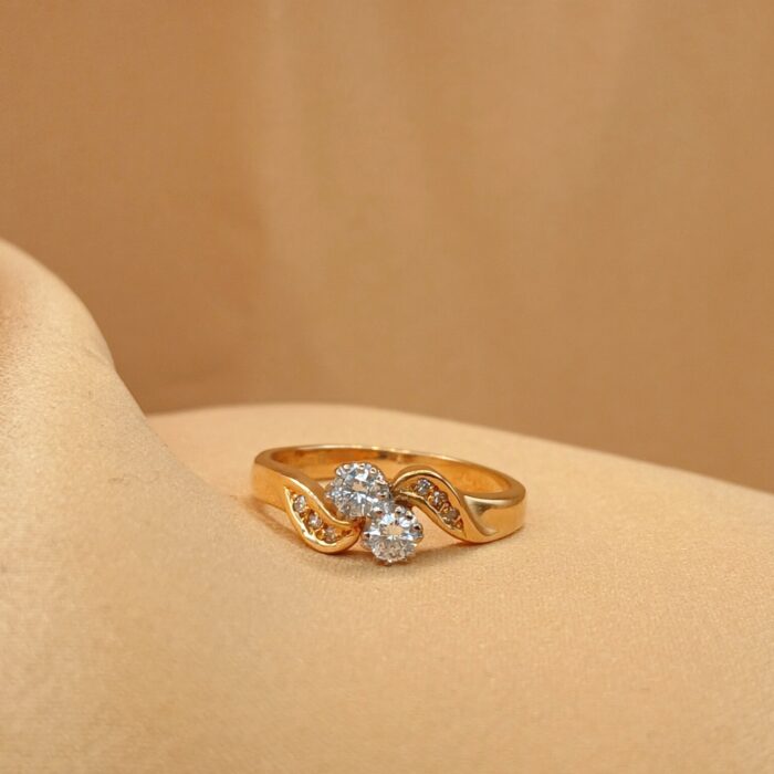 18ct Yellow Gold 0.25ct Diamond Two Stone Twist Ring from Ace Jewellery, Leeds