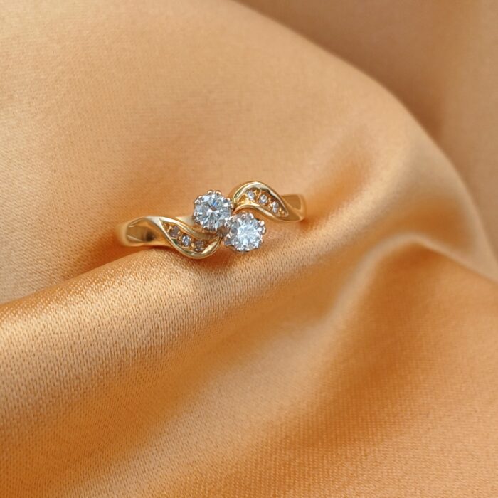 18ct Yellow Gold 0.25ct Diamond Two Stone Twist Ring from Ace Jewellery, Leeds